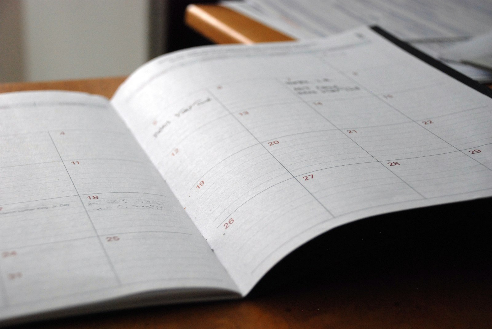 Open planner reminding patients to use dental benefits before year end